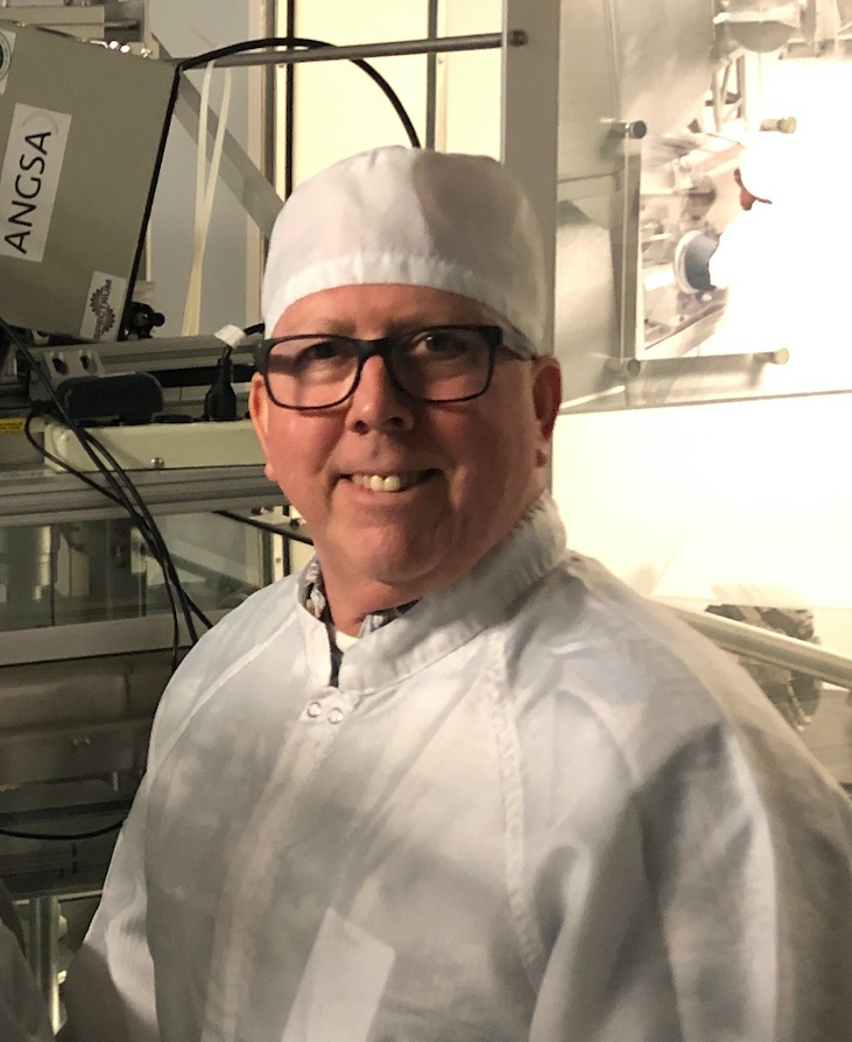 Honolulu ARCS Scholar Alum Dr. Paul Lucey Dr. Paul Lucey in labsuit