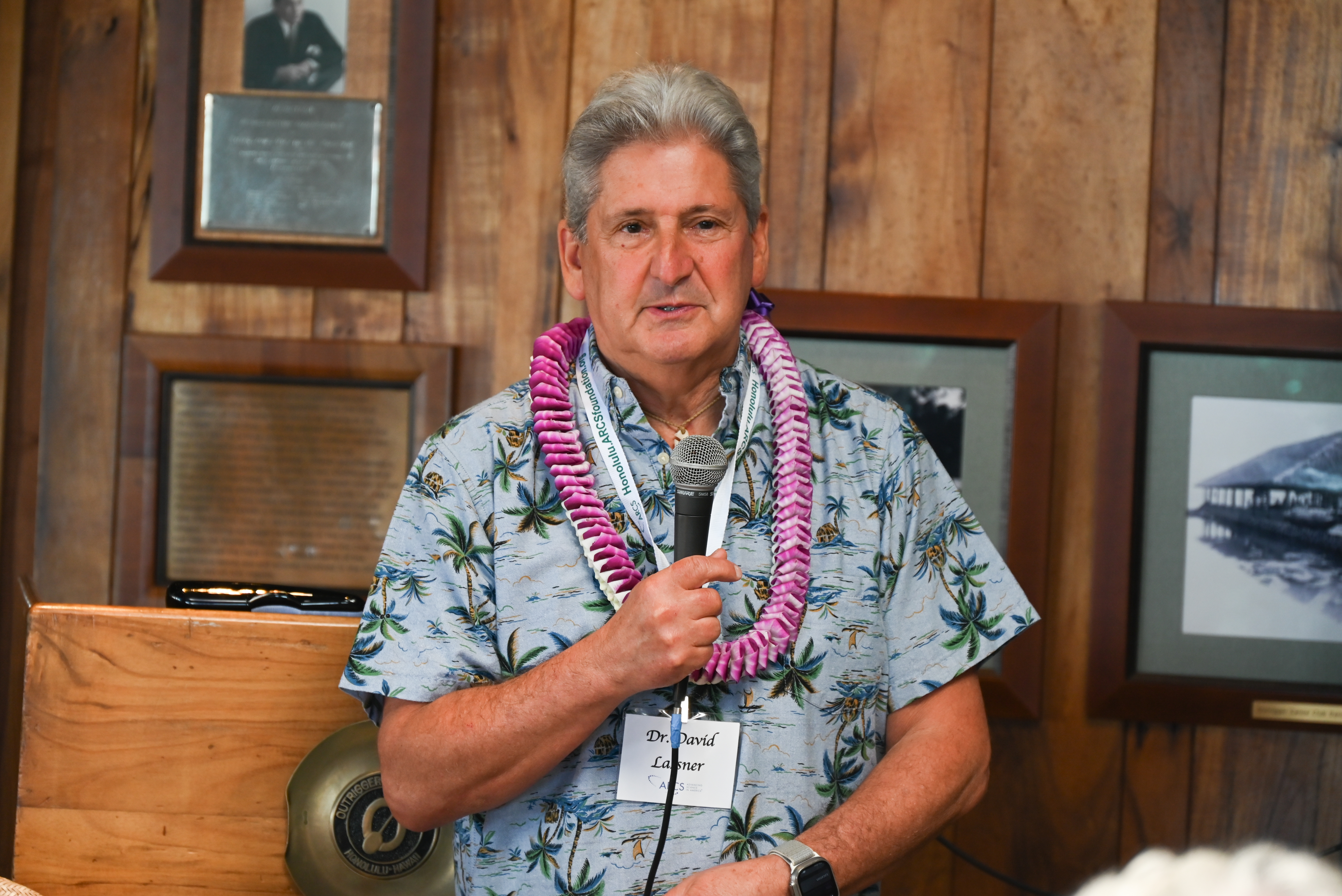 Dr. David Lassner, 2025 Honolulu ARCS Scientist of the Year Dr. David Lassner with microphone