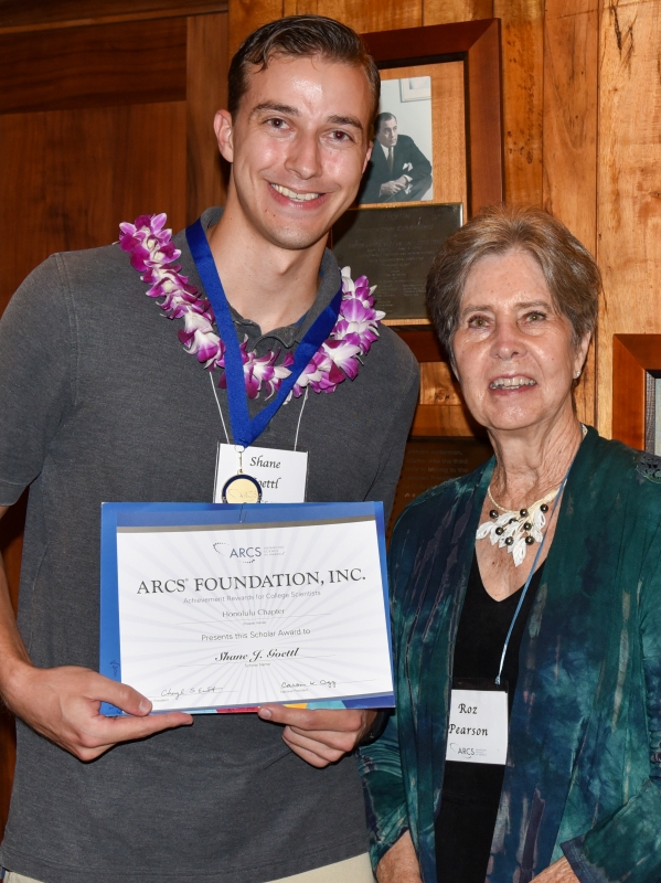 Shane Goettl with certificate
