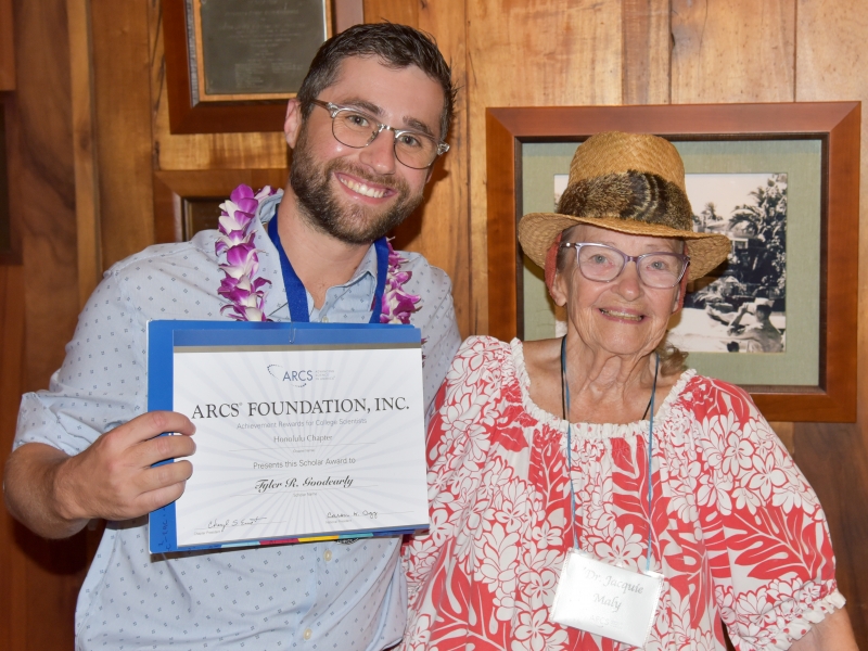 Tyler Goodearly with certificate