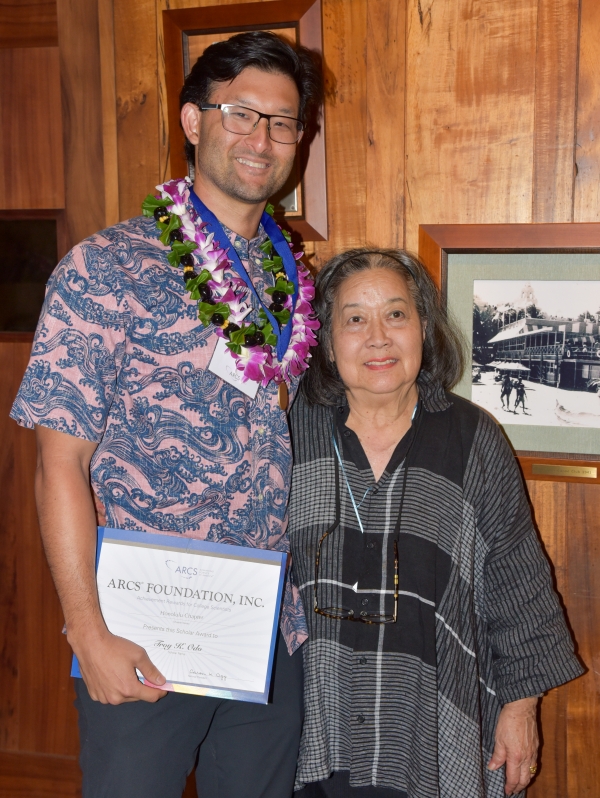 Troy Odo with certificate