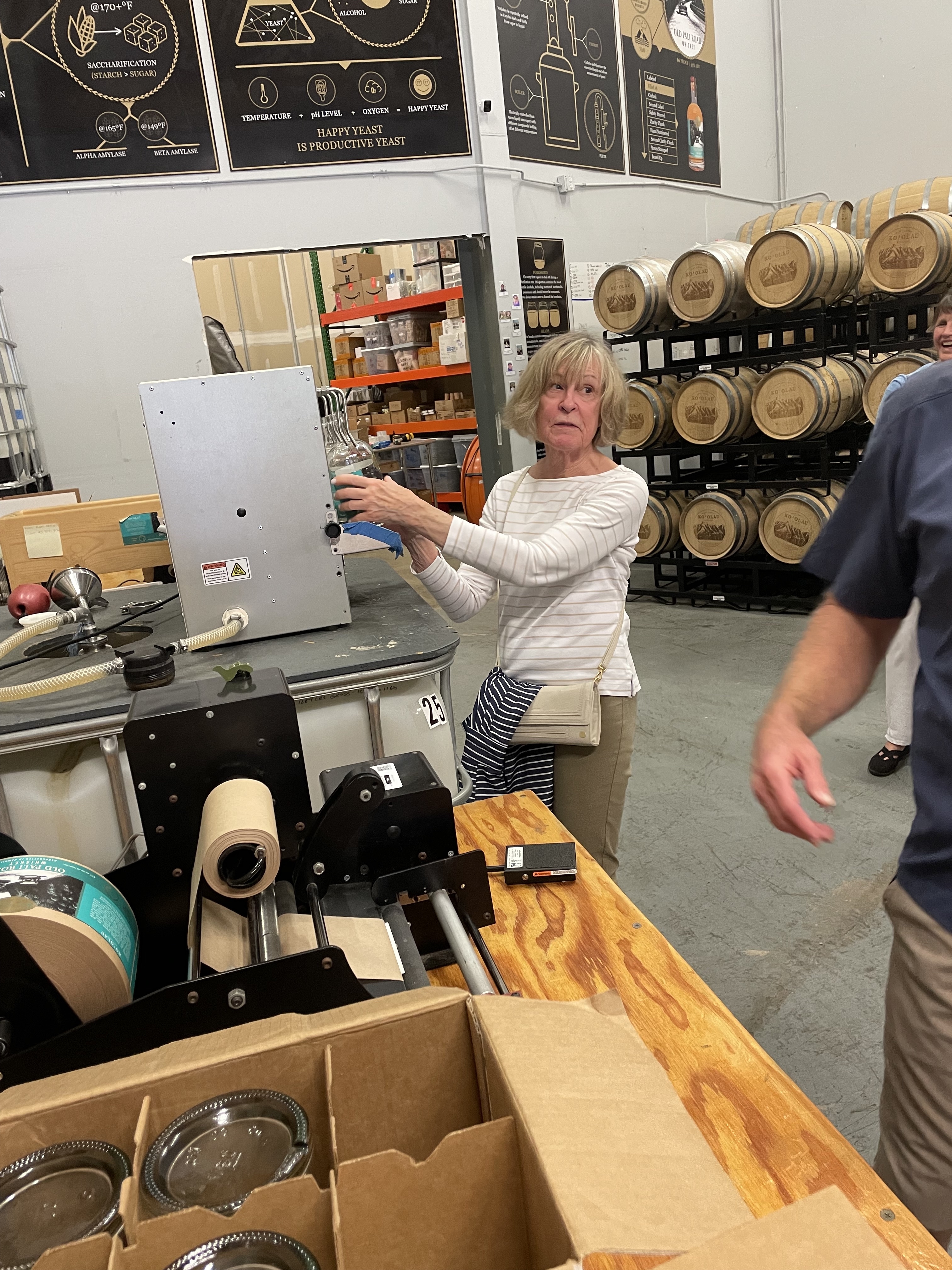 ARCS Foundation National President Beth Wainwright Beth Wainwright bottles whiskey