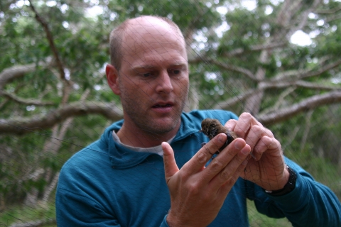 Eric VanderWerf holding bird