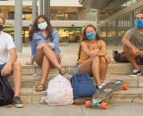 Masked students on the UH Manoa campus